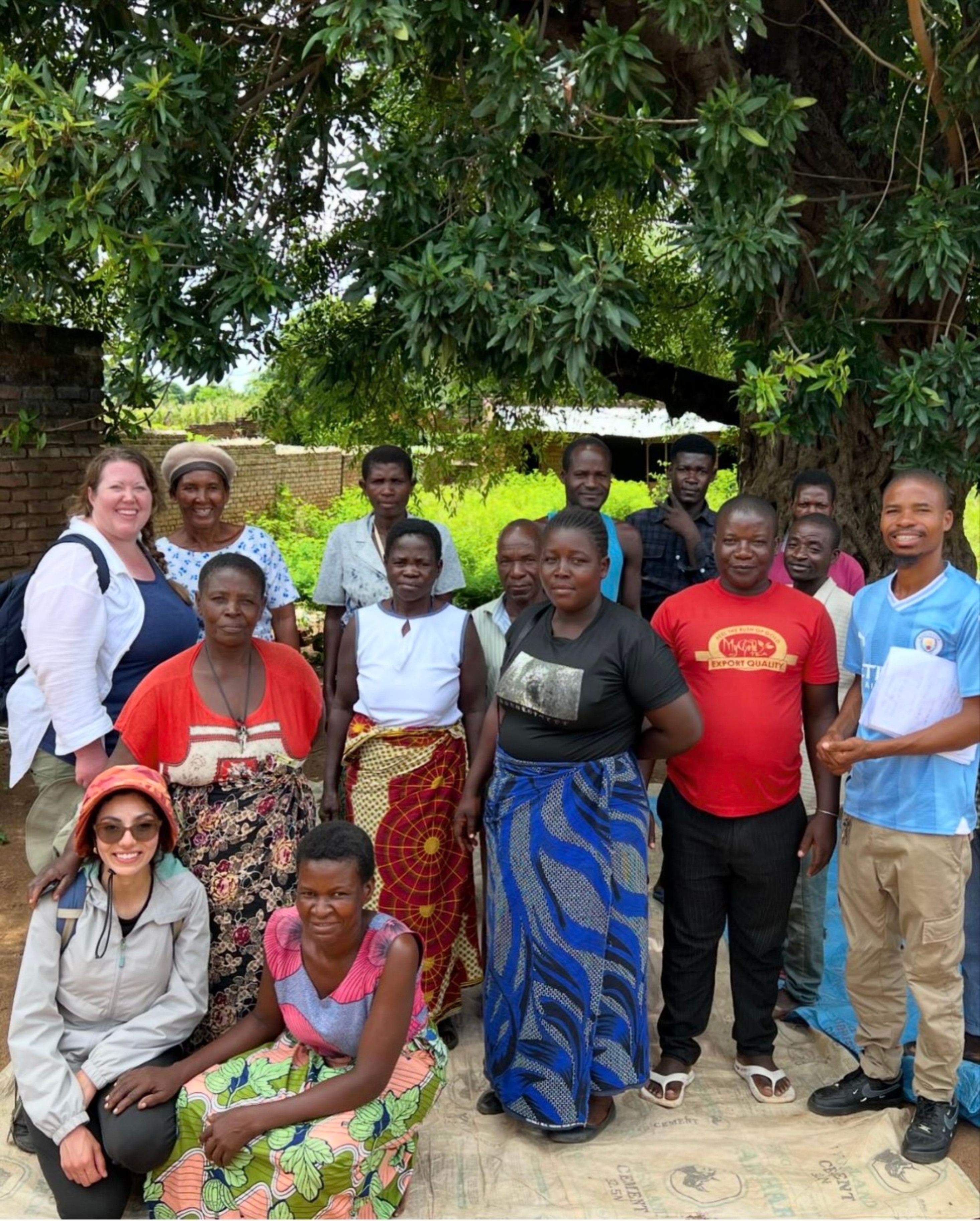 Weinman with local farmers in Malawi Weinman with local farmers in Malawi