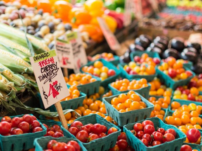 Farmers market type table with an assortment of fruits and vegetables