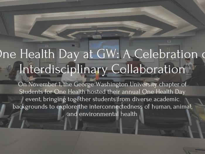 Picture with words in front, Title: One Health Day at GW: A Celebration of Interdisciplinary Collaboration. Subtitle: On November 1, the George Washington University chapter of Students for One Health hosted their annual One Health Day event, bringing together students from diverse academic backgrounds to explore the interconnectedness of human, animal, and environmental health. Picture features students in a classroom
