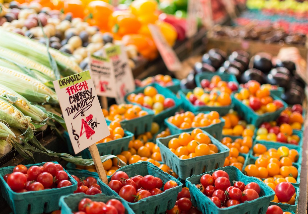Farmers market type table with an assortment of fruits and vegetables
