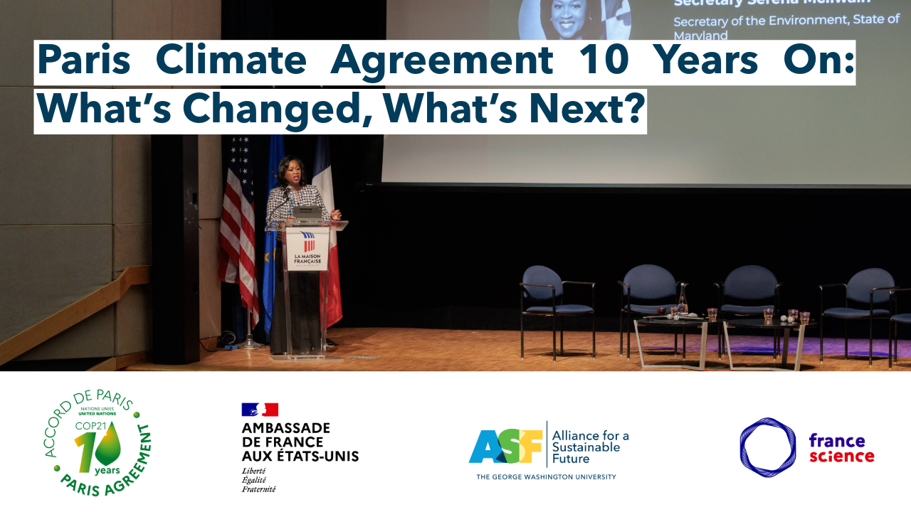 a woman at a podium stands on a stage